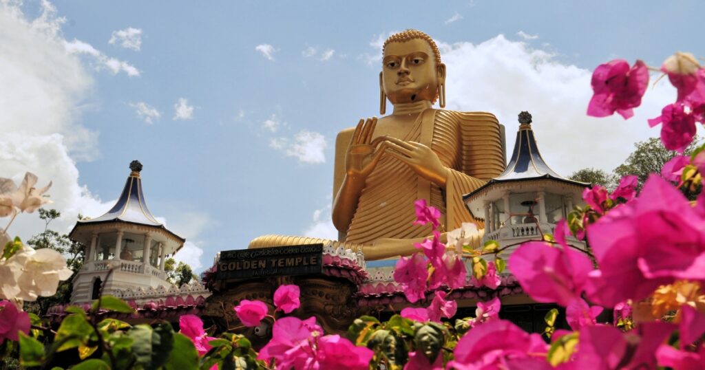 Buddha gold statue in dambulla