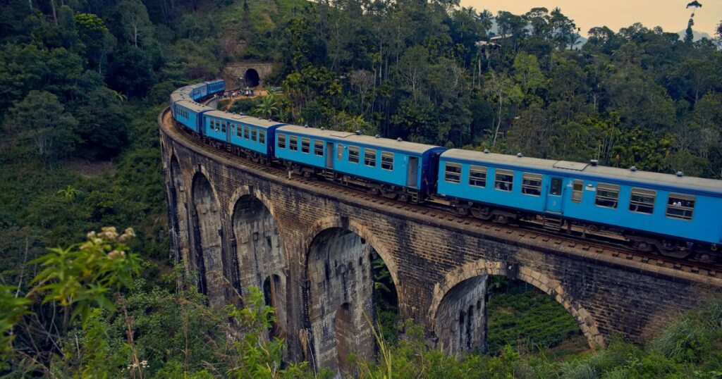 Train on nine arch bridge