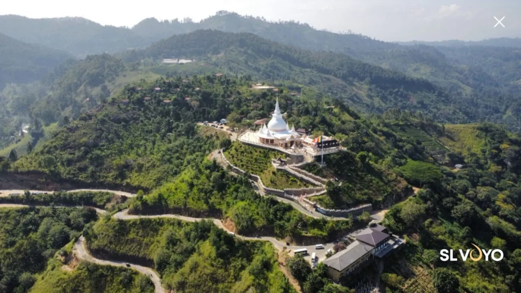 Kumbalwela Buddhist temple in Ella with mountain views and stupa
