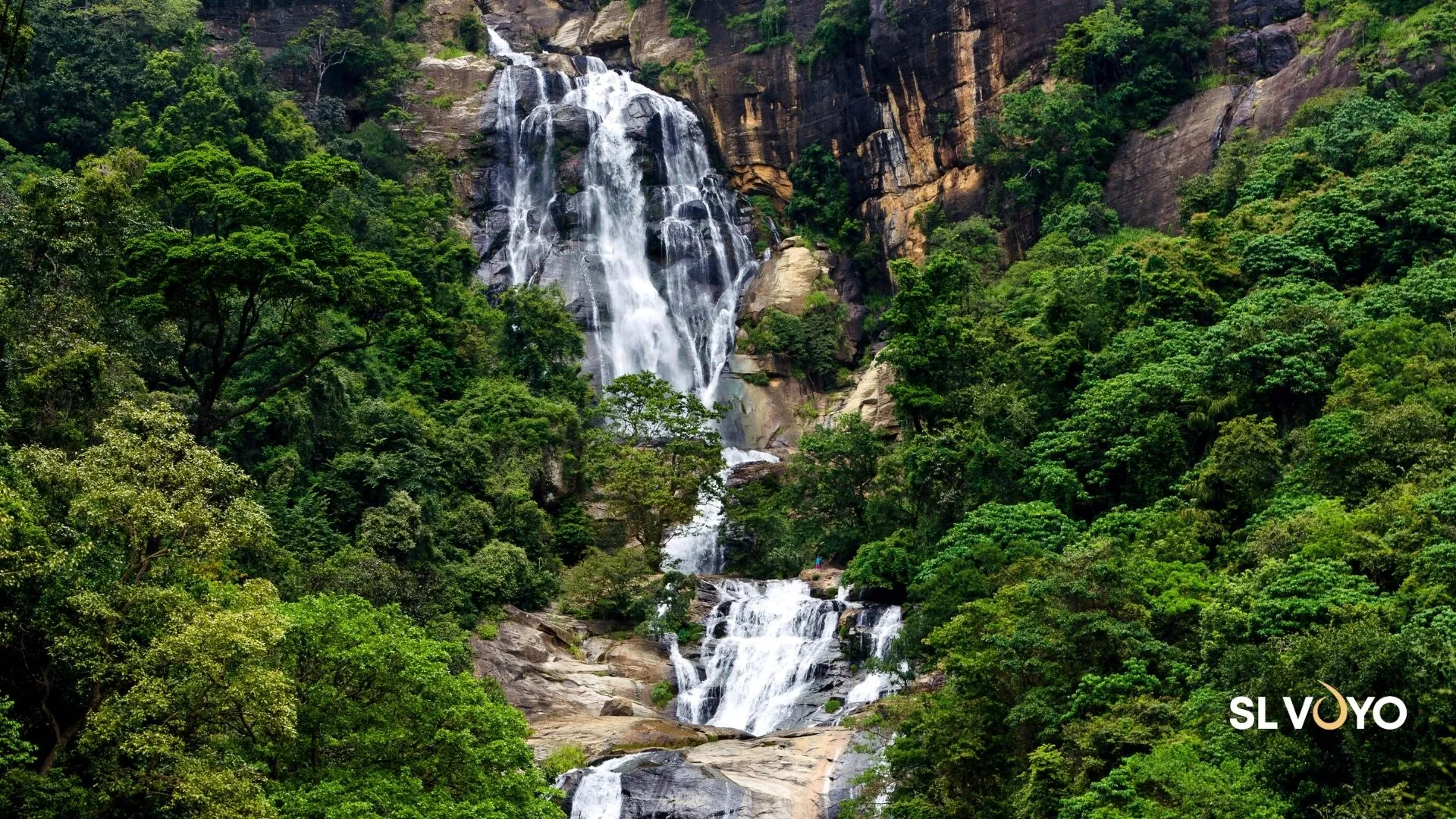 Ravana Ella Waterfall cascading down a rocky cliff near Ella town