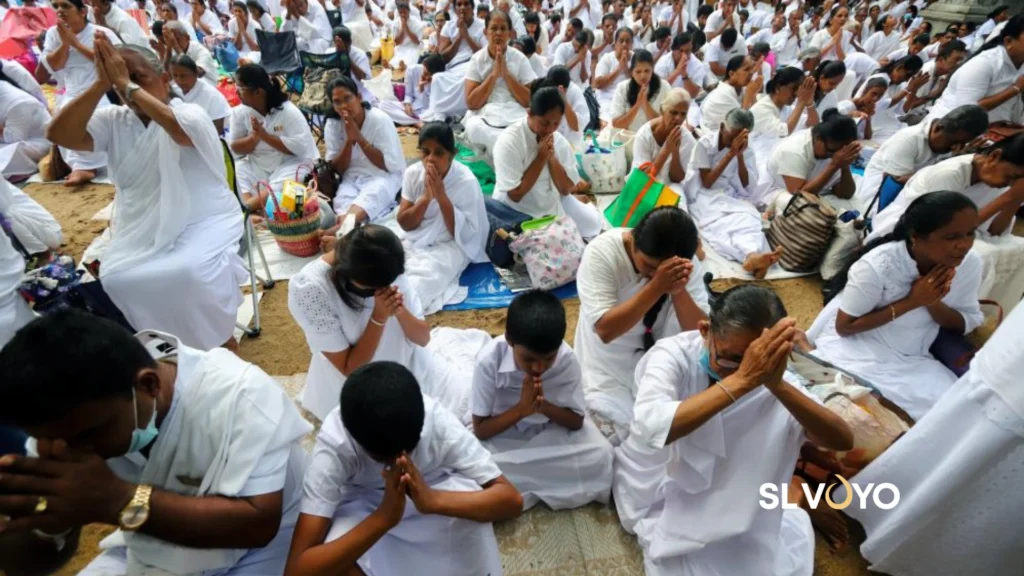 People praying in vesak
