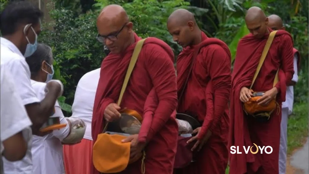 monks receiving alms