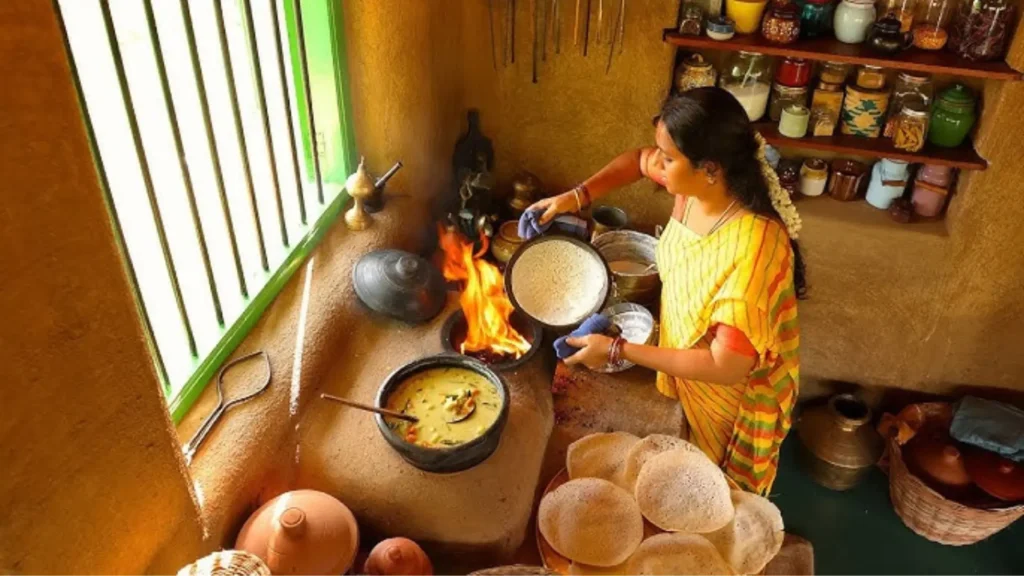 Sri Lankan woman traditionally preparing Pal Appam